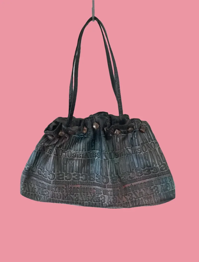 Boho metallic embossed typography bag with gemstone trim