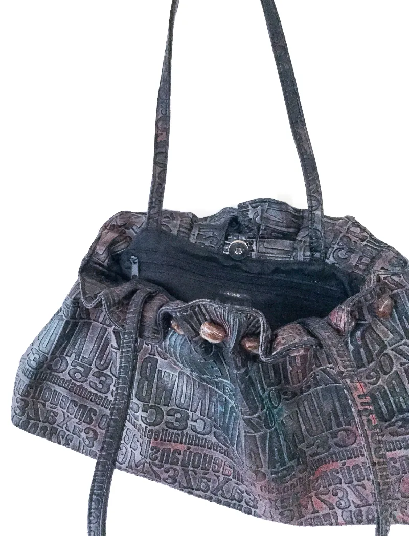 Boho metallic embossed typography bag with gemstone trim