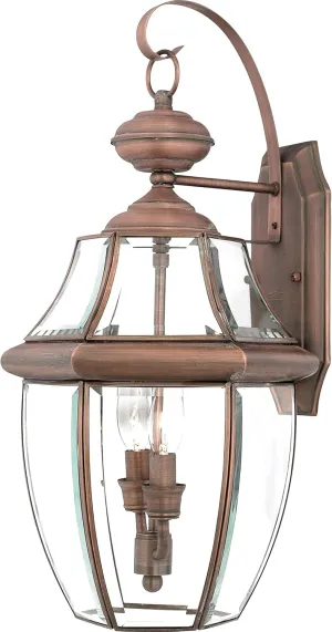 Quoizel Newbury Outdoor Wall Lantern, 20 Inch 2-Light Aged Copper Wall Sconce, French Country Exterior Wall Lantern Fixture, E12 Base, Clear Glass, Outside Lights for Patio, Porch, Garage, Yard